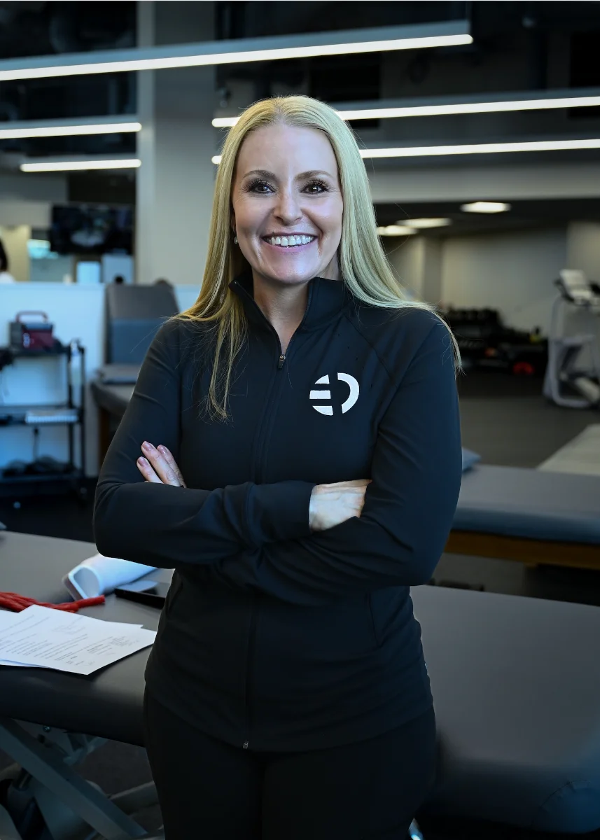 Heather Milligan treating an athlete